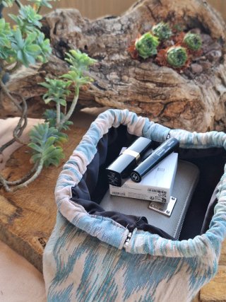 Pochette fatta a mano in tessuto