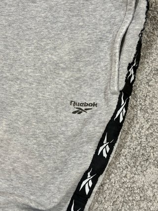 Pantalón Reebok jogger gris cinta logo XL