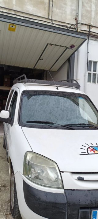 Baca Peugeot Partner 2004