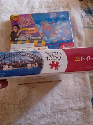 Juego Stick Storm y Puzzle 1000 piezas