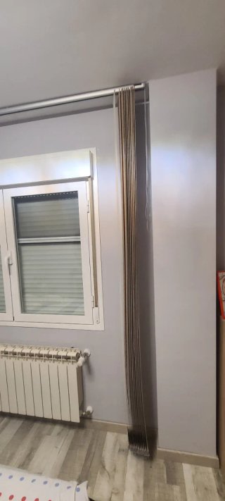 Tende verticali beige a lamelle