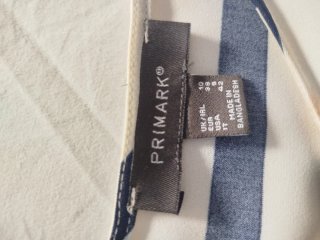Blusa de rayas azul y blanco