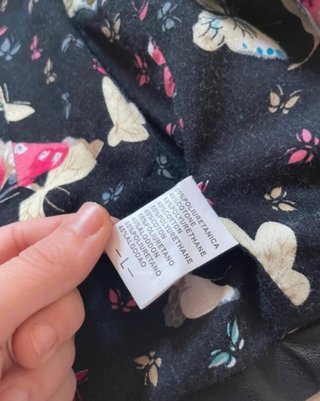 Bolero nero con fodera floreale