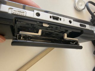 Sony PSP-1004 + Caricatore, Custodia e Accessori