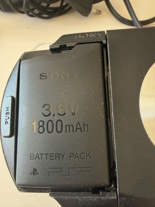Sony PSP-1004 + Caricatore, Custodia e Accessori