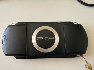 Sony PSP-1004 + Caricatore, Custodia e Accessori