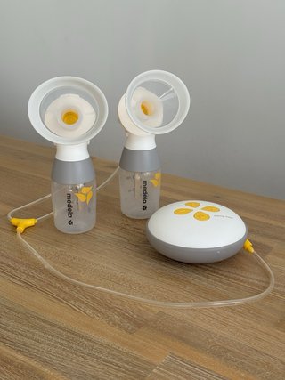 Extractor Medela Swing Maxi + botes almacenamiento
