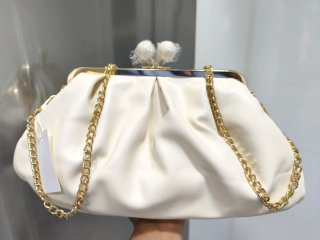 Bolso de fiesta blanco y dorado