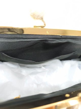 Bolso de fiesta blanco y dorado