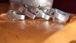 Ganci fermatovaglia acciaio inox a forma di fiore