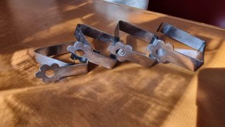 Ganci fermatovaglia acciaio inox a forma di fiore