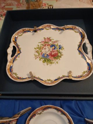 Juego de té de porcelana con bandeja