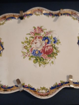 Juego de té de porcelana con bandeja