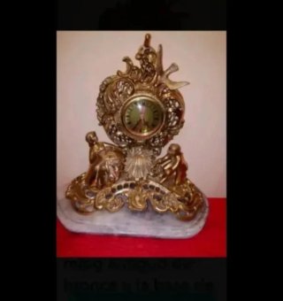 Reloj de sobremesa bronce figuras