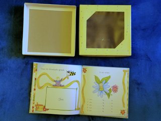 Album per neonati giallo con carrozzina
