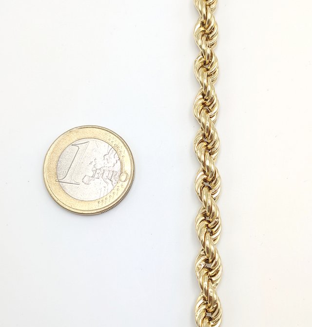 Cadena Salomónica de oro de 18k, 28.28 g, 74 cm.