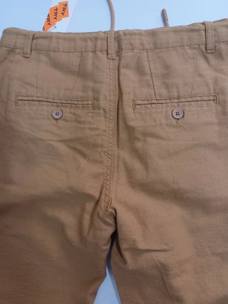 Pantalón niño T.10 mostaza imitación lino 140cm