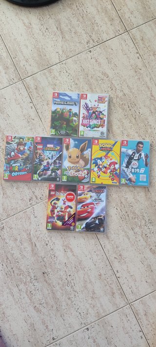 Lote 9 Juegos Nintendo Switch y consola