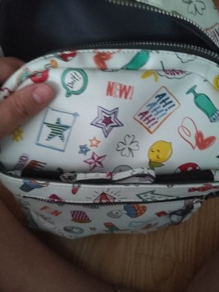 Mochila blanca con estampado divertido