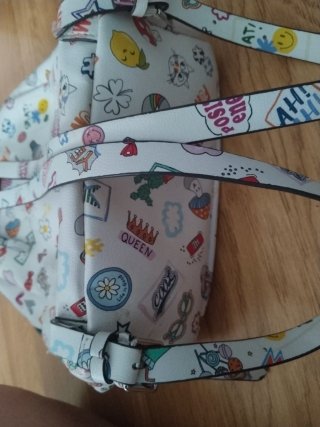 Mochila blanca con estampado divertido