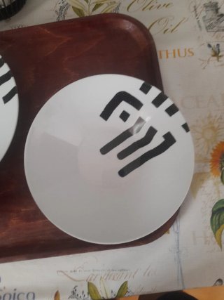 4 platos hondos y llanos de Eduardo chillido Juego