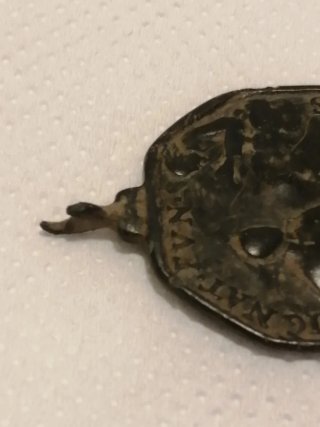 Medalla antigua con anilla para reparar