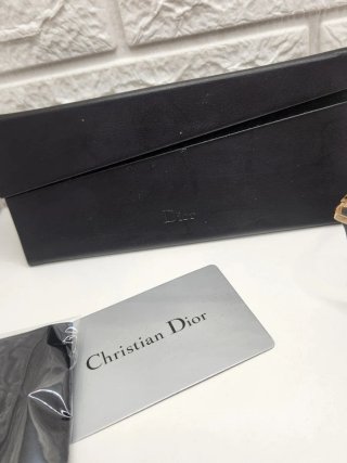Gafas de sol Christian Dior negras y doradas