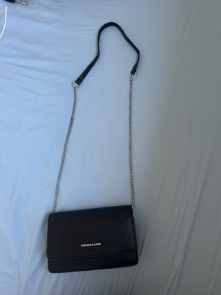 Bolso negro con espejo