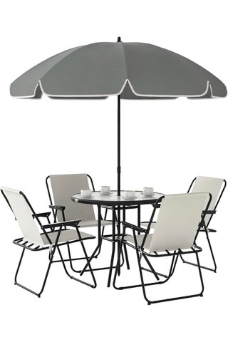 Mesa de cristal con 4 sillas y sombrilla a estrena