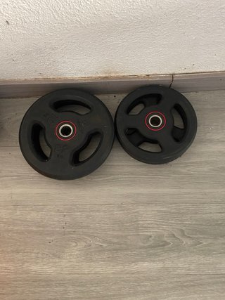 Discos de pesas 10 y 5kg (2 unidades de cada)