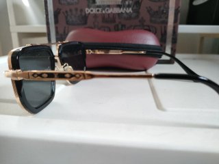 Gafas de sol Louis Vuitton negras y doradas