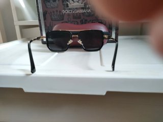 Gafas de sol Louis Vuitton negras y doradas