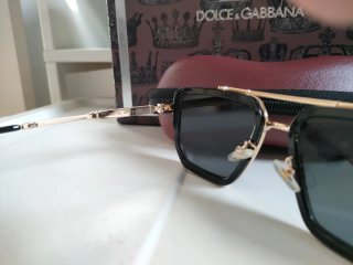 Gafas de sol Louis Vuitton negras y doradas
