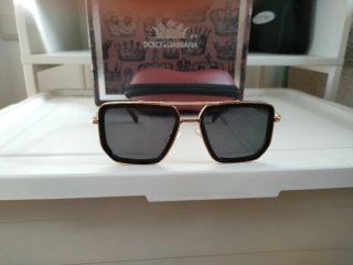 Gafas de sol Louis Vuitton negras y doradas