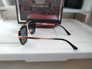 Gafas de sol Louis Vuitton negras y doradas
