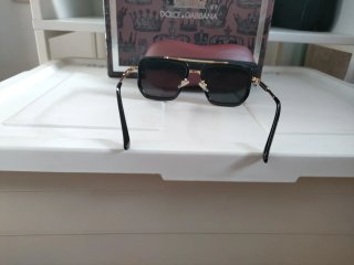 Gafas de sol Louis Vuitton negras y doradas