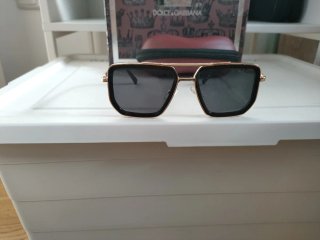 Gafas de sol Louis Vuitton negras y doradas