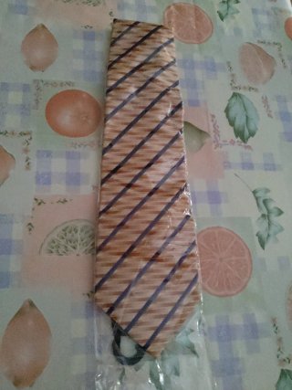 Corbata beige con rayas marrones