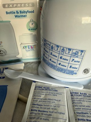 Calienta biberones y comida, marca Avent.