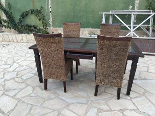 Mesa ratán y 4 sillas cristal 180x90