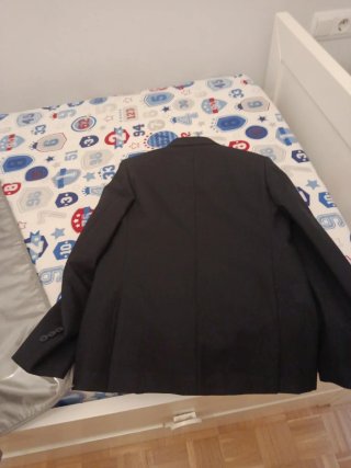 Chaqueta americana adolescente azul marino.