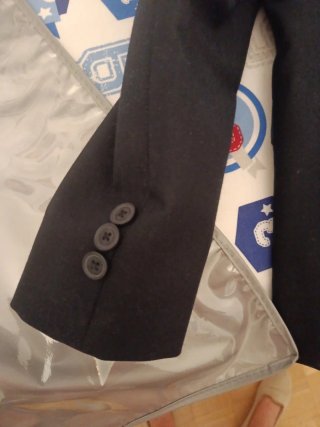 Chaqueta americana adolescente azul marino.