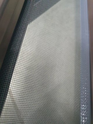 Mosquitera enrollable para ventana