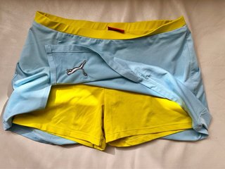 Falda- pantalón deportiva Puma azul y amarilla