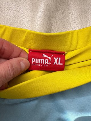 Falda- pantalón deportiva Puma azul y amarilla