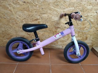 Bicicleta sin pedales rosa