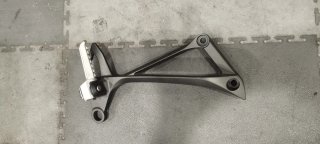 Soporte estribera/escape ZX10R 21-25