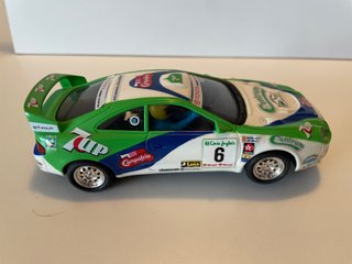 Scalextric SCX Toyota Celica 7-UP matchbox en caja