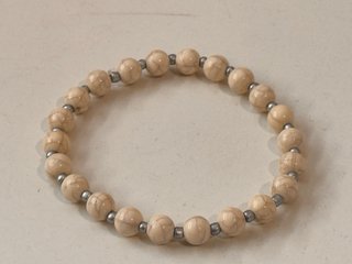 Bracciale perline bianche e argento