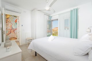 Casa de vacaciones con vistas al mar y aire acondi